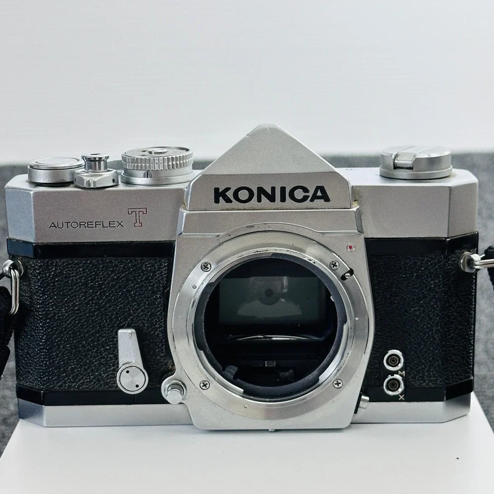 Konica Autoreflex T 35mm SLR Film Camera with Soligor Lens Silver Black UNTESTED
